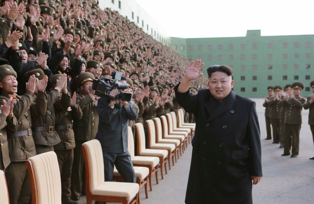 North Korea's leader Kim attends a photo session with the participants of a meeting of KPA battalion commanders and political instructors in this undated photo released by KCNA in Pyongyang