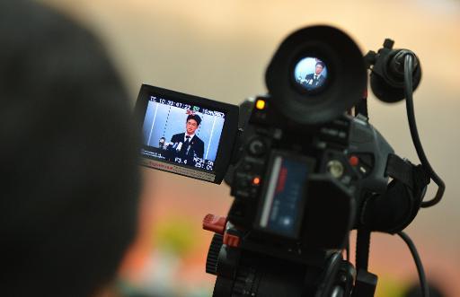 Periodista chino detenido “confiesa” a la televisión “informaciones falsas”