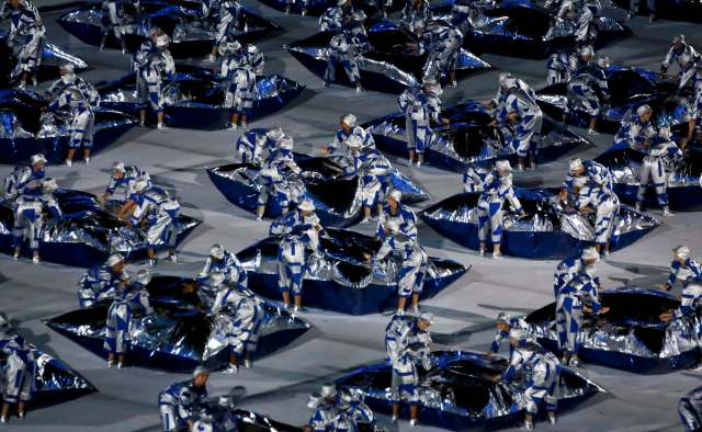 2016 Rio Olympics - Opening Ceremony - Maracana - Rio de Janeiro, Brazil - 05/08/2016. Performers take part in the opening ceremony. REUTERS/Reinhard Krause FOR EDITORIAL USE ONLY. NOT FOR SALE FOR MARKETING OR ADVERTISING CAMPAIGNS.