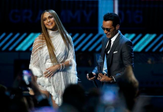 Jennifer Lopez and Marc Anthony react after kissing each other after she presented him with award honoring him as Latin Recording Academy person of the year at the 17th Annual Latin Grammy Awards in Las Vegas, Nevada, U.S., November 17, 2016. REUTERS/Mario Anzuoni