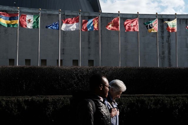 NEW YORK, NY - JANUARY 26: Pedestrians walk by the United Nations in midtown Manhattan on January 26, 2017 in New York City. President Donald Trump is preparing executive orders that would reduce US funding of the United Nations and other international organizations. The first order would cut funding for any U.N. agency or other international group that meets any specific criteria. Organizations and groups to receive cuts may include peacekeeping missions, the International Criminal Court and the United Nations Population Fund.   Spencer Platt/Getty Images/AFP