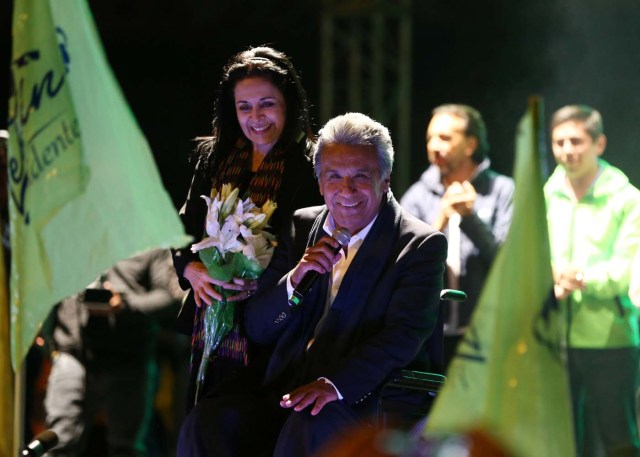 Lenin Moreno, candidate of the ruling PAIS Alliance Party, and his wife Rocio Gonzalez celebrate the early results of the presidential election with supporters in Quito, Ecuador February 19, 2017. REUTERS/Mariana Bazo