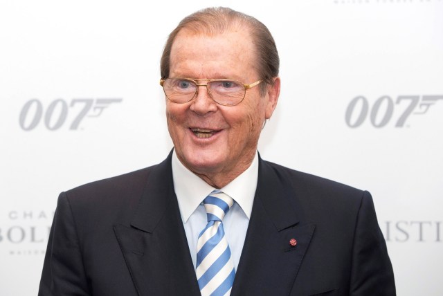 FILE PHOTO: Actor Sir Roger Moore attends the 50 Years of James Bond Auction at Christies in London, October 5, 2012. REUTERS/Neil Hall/File Photo TPX IMAGES OF THE DAY