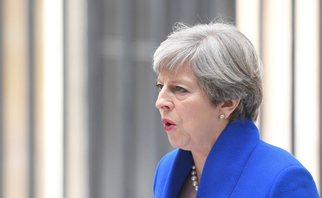 Britain's Prime Minister Theresa May makes a statement in Downing Street after traveling to Buckingham Palace to ask the Queen's permission to form a minority government, in London, June 9, 2017. REUTERS/Toby Melville