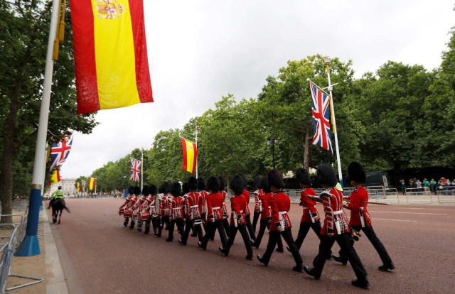 The Union flag hangs alongside the flag of Spain ahead of the visit of King Felipe VI and Queen Letizia of Spain, in the Mall in London, Britain July 11, 2017. REUTERS/Peter Nicholls