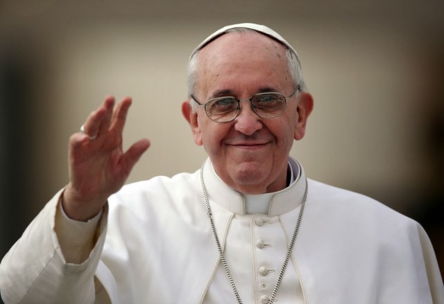 VATICAN CITY, VATICAN - MARCH 27: Pope Francis waves to the crowd as he drives around St Peter's Square ahead of his first weekly general audience as pope on March 27, 2013 in Vatican City, Vatican. Pope Francis held his weekly general audience in St Peter's Square today (Photo by Christopher Furlong/Getty Images)