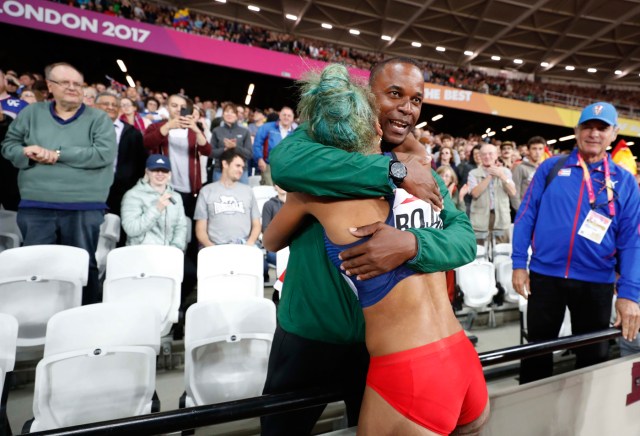 Athletics - World Athletics Championships - Women's Triple Jump Final – London Stadium, London, Britain - August 7, 2017. Yulimar Rojas of Venezuela celebrates winning gold with her coach. REUTERS/Phil Noble