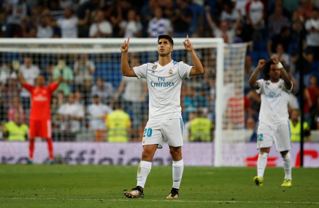 Soccer Football - Spanish La Liga Santander - Real Madrid vs Valencia - Madrid, Spain - August 27, 2017 Real Madrid’s Marco Asensio celebrates scoring their second goal REUTERS/Javier Barbancho