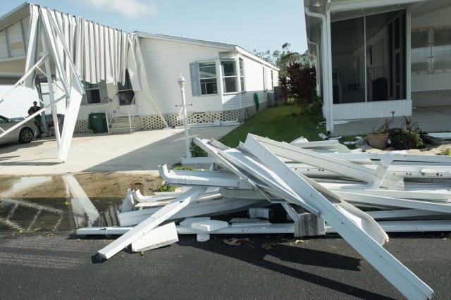 The damaged house of Stasia Walsh is seen at the Enchanted Shores manufactured home park in Naples, Florida, on September 11, 2017 after Hurricane Irma hit Florida. / AFP PHOTO / NICHOLAS KAMM