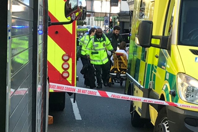 Emergency personnel attend to a person after an incident at Parsons Green underground station in London, Britain, September 15, 2017.  REUTERS/Yann Tessier