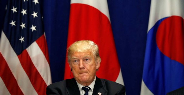 U.S. President Donald Trump listens during a meeting with South Korean President Moon Jae-in and Japanese Prime Minister Shinzo Abe during the U.N. General Assembly in New York, U.S., September 21, 2017. REUTERS/Kevin Lamarque