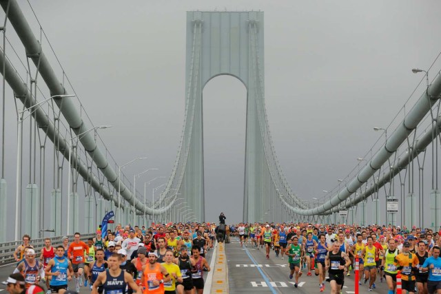 The first wave of runners make their way across the Verrazano-Narrows Bridge during the start of the New York City Marathon in New York, U.S., November 5, 2017. REUTERS/Lucas Jackson