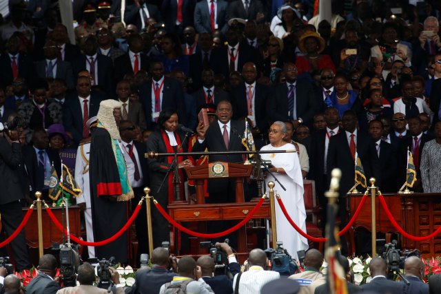 Kenya's President Uhuru Kenyatta takes oath of office during inauguration ceremony at Kasarani Stadium in Nairobi, Kenya November 28, 2017. REUTERS/Thomas Mukoya