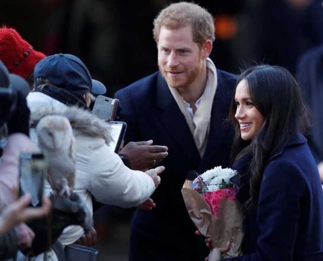 Britain's Prince Harry and his fiancee Meghan Markle greet well wishers as they arrive at an event in Nottingham, December 1, 2017. REUTERS/Eddie Keogh