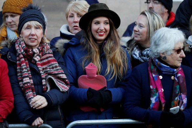Members of the public wait to see Britain's Prince Harry and his fiancee Meghan Markle as they arrive at an event in Nottingham, Britain, December 1, 2017. REUTERS/Adrian Dennis/Pool