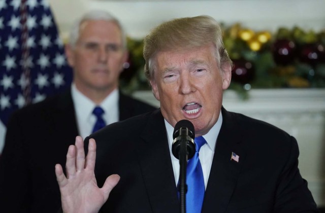 U.S. President Donald Trump gives a statement on Jerusalem, during which he recognized Jerusalem as the capital of Israel, as he appears with Vice President Mike Pence in the Diplomatic Reception Room of the White House in Washington, U.S., December 6, 2017. REUTERS/Jonathan Ernst