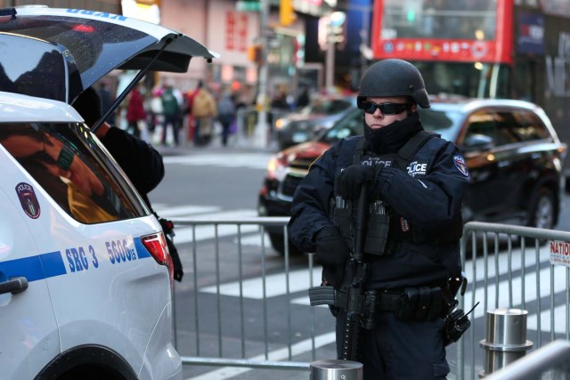 A New York Police Department Counterterrorism Bureau member stands in Times Square to provide security ahead of New Year's Eve celebrations in Manhattan, New York, U.S. December 28, 2017. REUTERS/Amr Alfiky