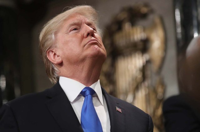 U.S. President Donald Trump delivers his first State of the Union address to a joint session of Congress inside the House Chamber on Capitol Hill in Washington, U.S., January 30, 2018. REUTERS/Win McNamee/Pool