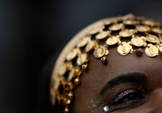 A reveller takes part in the annual block party Escravos da Maua as part of pre-carnival festivities in Rio de Janeiro, Brazil, February 4, 2018. Picture taken February 4, 2018. REUTERS/Ricardo Moraes