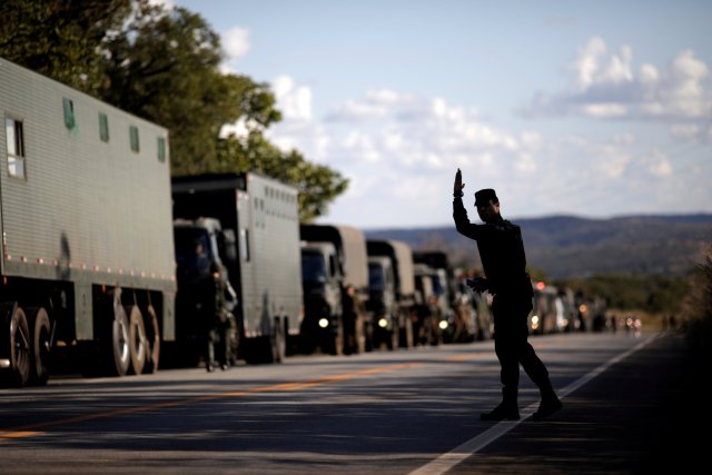 REFILE - CORRECTING NAME OF HIGHWAY A military officer takes position at GO-010 highway in Goias, Brazil May 26, 2018. REUTERS/Ueslei Marcelino