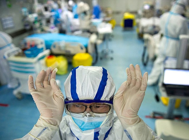 Autoridades sanitarias de Wuhan explican cómo mantenerse alejado del coronavirus